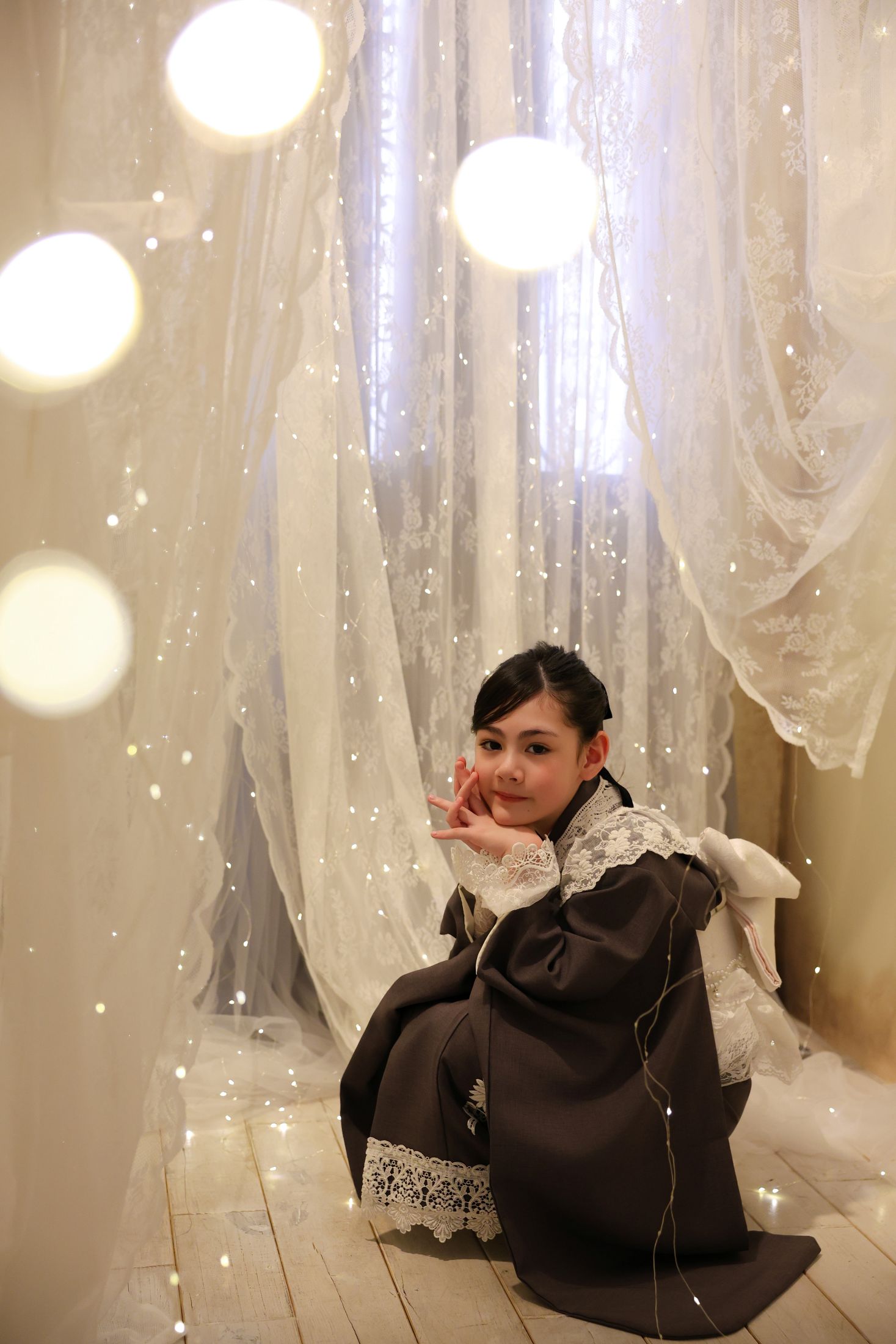 着物を着た7歳の女の子。心斎橋での七五三のスタジオ撮影。店舗住所：大阪府大阪市中央区南船場3-4-26 THE PEAK SHINSAIBASHI 12F